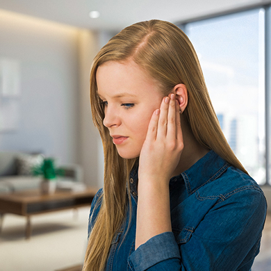 Woman with persistent ear clogging